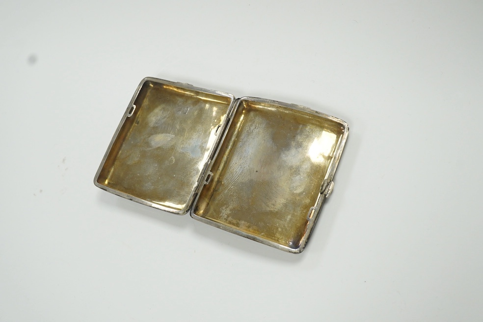 An early 20th century Chinese Export white metal cigarette case, by Sing Fat, with applied dragon decoration, 80mm, 3.8oz. Condition - fair